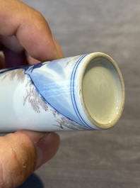 Four Chinese blue, white and copper-red snuff bottles and a blue and white snuff bottle, 19/20th C.