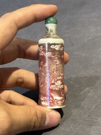 A Chinese copper-red 'dragon' snuff bottle and two famille verte snuff bottles, Gu Yue Xuan 古月軒 and Daoguang mark, 19th C.