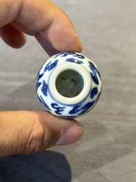 Three Chinese blue and white 'dragon' snuff bottles, 19th C.