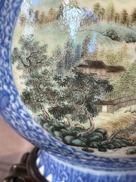 A pair of Chinese famille rose 'hu' vases with fine landscapes, Qianlong mark, Republic