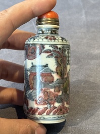 Five Chinese blue, white and copper-red snuff bottles, 19/20th C.