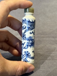 Three Chinese blue and white 'dragon' snuff bottles, 19th C.