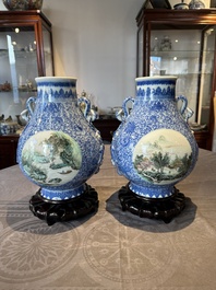 A pair of Chinese famille rose 'hu' vases with fine landscapes, Qianlong mark, Republic