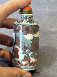 Five Chinese blue, white and copper-red snuff bottles, 19/20th C.