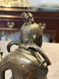 A fine Chinese bronze figure of a divinity, Ming