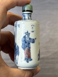 Three Chinese blue, white and copper-red snuff bottles, 19/20th C.