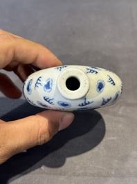 Three Chinese blue, white and copper-red snuff bottles and a blue and white snuff bottle, Qianlong mark, 19th C.