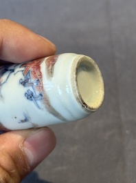 A Chinese blue, white and copper-red 'landscape' snuff bottle, 19th C.
