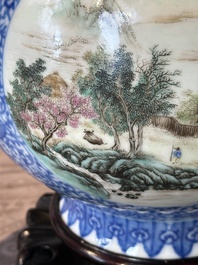 A pair of Chinese famille rose 'hu' vases with fine landscapes, Qianlong mark, Republic