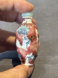 A Chinese blue, white and copper-red 'dragon' snuff bottle, Chenghua mark, 18th C.