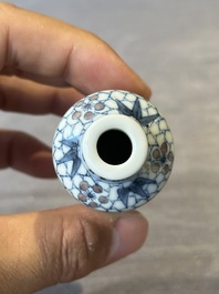 Three Chinese blue, white and copper-red snuff bottles, 19/20th C.