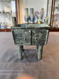 A Chinese rectangular bronze food vessel, 'fang ding 方鼎', Western Zhou