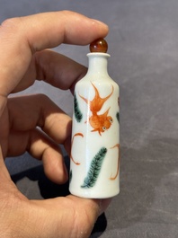 A Chinese copper-red 'dragon' snuff bottle and two famille verte snuff bottles, Gu Yue Xuan 古月軒 and Daoguang mark, 19th C.