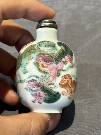 Three Chinese famille rose and iron-red 'Buddhist lion' and 'dragon' snuff bottles, 19th C.