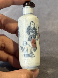 Five Chinese blue, white and copper-red snuff bottles, 19/20th C.