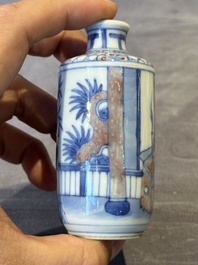 Four Chinese blue, white and copper-red snuff bottles and a blue and white snuff bottle, 19/20th C.
