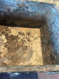 A Chinese rectangular bronze food vessel, 'fang ding 方鼎', Western Zhou
