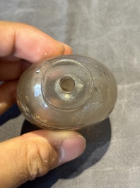 Five Chinese rock crystal and needle agate snuff bottles, Qing