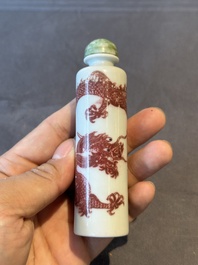 A Chinese blue, white and copper-red snuff bottle with the zodiac and a copper-red 'dragon' snuff bottle, 18/19th C.