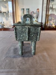A Chinese rectangular bronze food vessel, 'fang ding 方鼎', Western Zhou