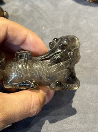 Six Chinese smoky quartz animal-form snuff bottles, 19th/20th C.