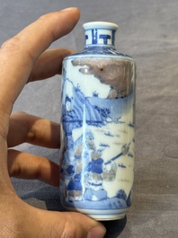 Four Chinese blue, white and copper-red snuff bottles and a blue and white snuff bottle, 19/20th C.