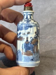 Five Chinese blue, white and copper-red snuff bottles, 19/20th C.