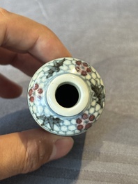Five Chinese blue, white and copper-red snuff bottles, 19/20th C.