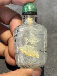 Five Chinese rock crystal and needle agate snuff bottles, Qing