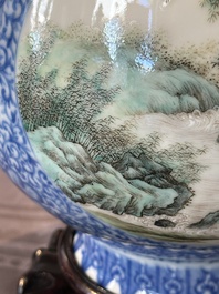 A pair of Chinese famille rose 'hu' vases with fine landscapes, Qianlong mark, Republic