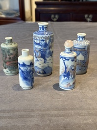 Four Chinese blue, white and copper-red snuff bottles and a blue and white snuff bottle, 19/20th C.