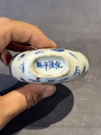 Three Chinese blue, white and copper-red snuff bottles and a blue and white snuff bottle, Qianlong mark, 19th C.