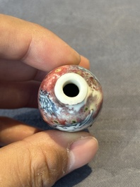 A Chinese blue, white and copper-red 'dragon' snuff bottle, Chenghua mark, 18th C.