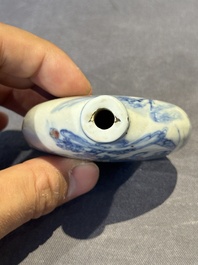 Three Chinese blue, white and copper-red snuff bottles and a blue and white snuff bottle, Qianlong mark, 19th C.