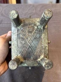 A Chinese rectangular bronze food vessel, 'fang ding 方鼎', Western Zhou