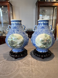 A pair of Chinese famille rose 'hu' vases with fine landscapes, Qianlong mark, Republic