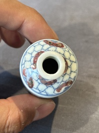 Five Chinese blue, white and copper-red snuff bottles, 19/20th C.