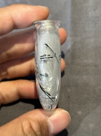 Five Chinese rock crystal and needle agate snuff bottles, Qing