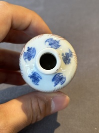 Two Chinese blue, white and copper-red 'mythical animals' snuff bottles, Qianlong mark and of the period