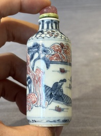 Three Chinese blue, white and copper-red snuff bottles, 19/20th C.