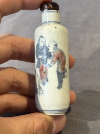 Five Chinese blue, white and copper-red snuff bottles, 19/20th C.