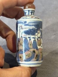 Five Chinese blue, white and copper-red snuff bottles, 19/20th C.