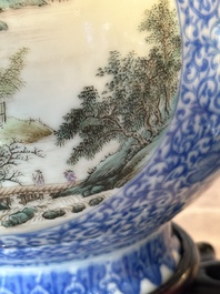 A pair of Chinese famille rose 'hu' vases with fine landscapes, Qianlong mark, Republic