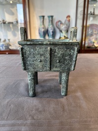 A Chinese rectangular bronze food vessel, 'fang ding 方鼎', Western Zhou