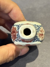 A Chinese blue, white and copper-red snuff 'deer' bottle, Yongzheng mark and of the period