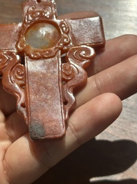 A Chinese white and red jade 'crucifix' pendant, 19th C.