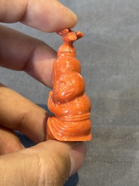 A Chinese carved red coral 'boy and vase' snuff bottle and stopper, 19th C.