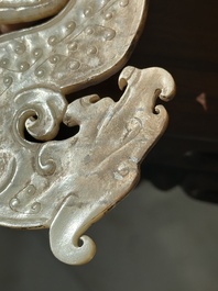 A Chinese nephrite jade ark-shaped 'chilong' plaque, Zhou/Han