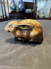 A fine Chinese cafe-au-lait glazed hare on wooden stand, Tian 天 mark, Qing