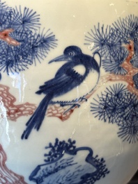 A fine Chinese blue, white and copper-red 'magpie and pine tree' vase, Yongzheng/Qianlong